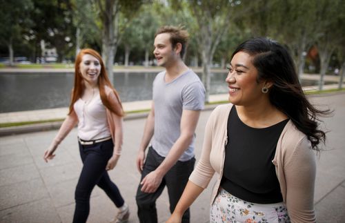 young adults walking together