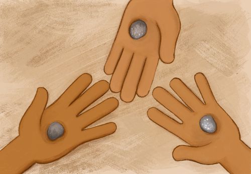 three girls each holding stone in hand