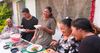 family eating watermelon