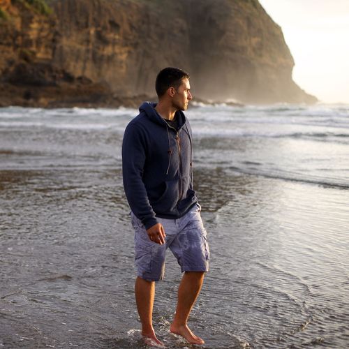 man walking on beach