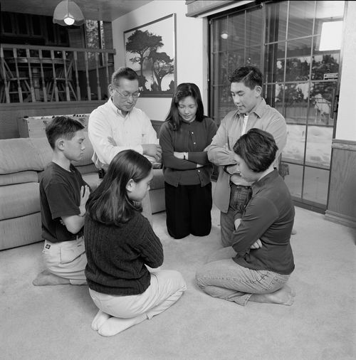 family praying