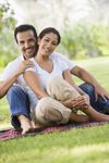 Couple relaxing in park