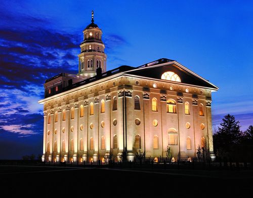 Night time shot of the Nauvoo Illinois Temple.  The photograph is taken looking west, showing the temple from the back.