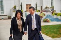 couple walking outside temple