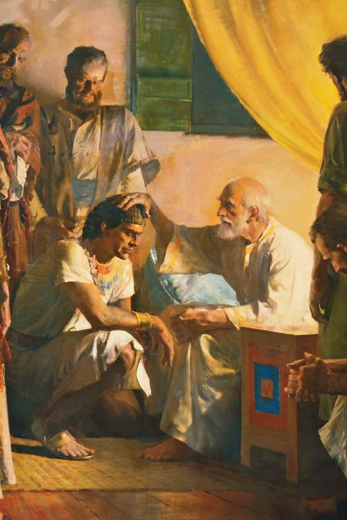 The Old Testament prophet Israel (Jacob) with his sons gathered around him. One of the sons (Joseph) is kneeling before his father. Israel has his hand on the son's head as he prepares to give him a priesthood blessing.