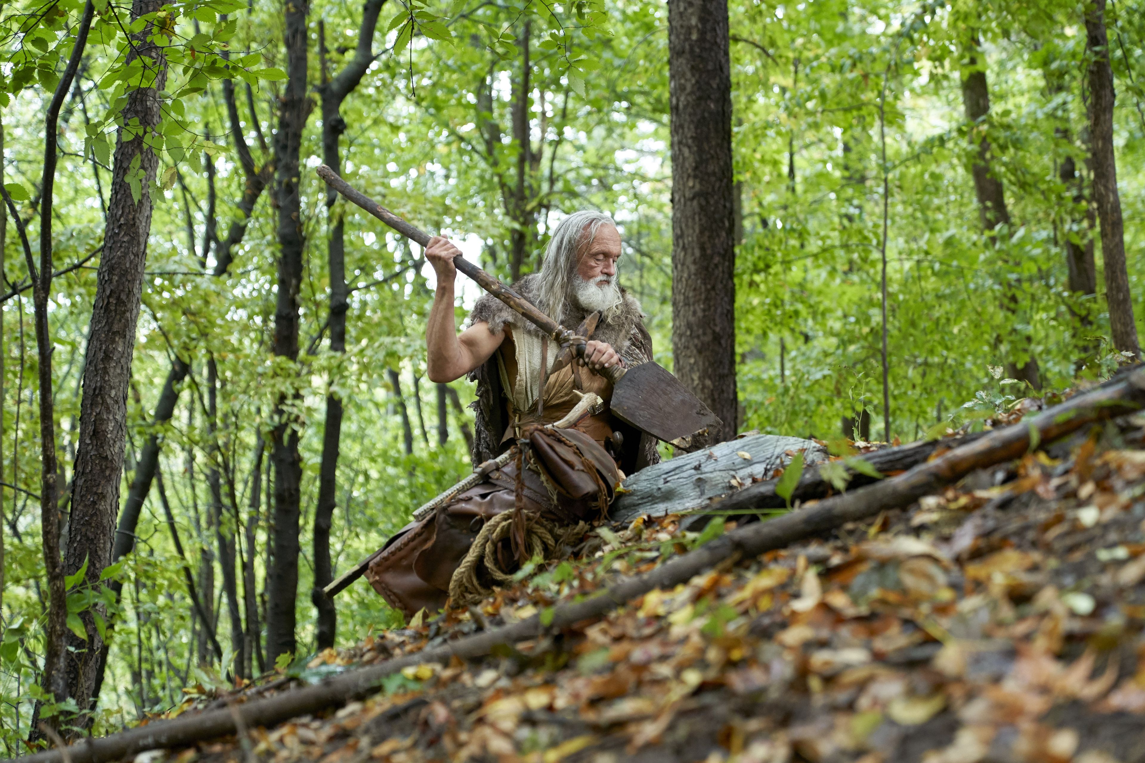 Moroni, son of Mormon, moves a rock on the Hill Cumorah as he prepares to hide the plates.