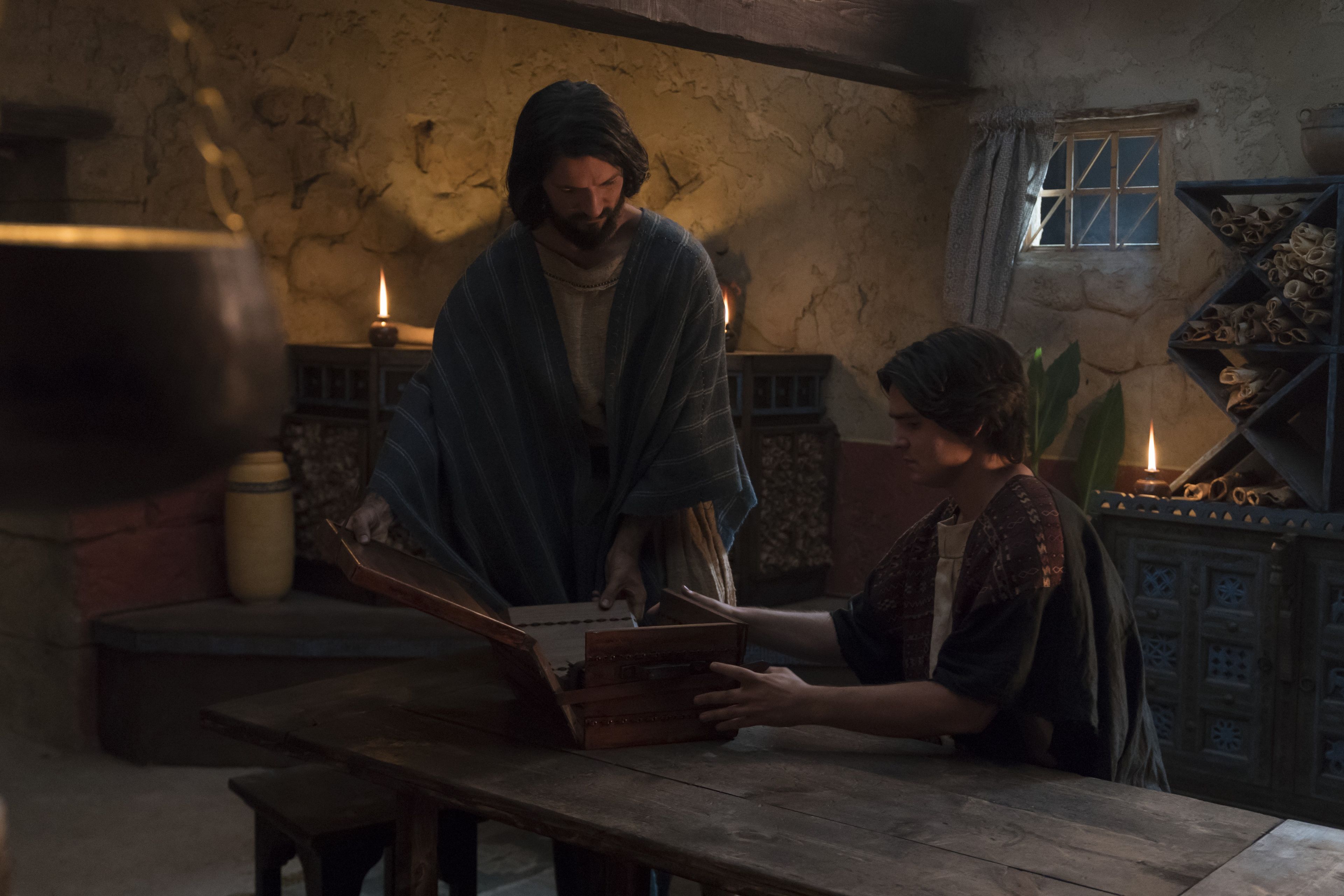Alma the Younger presents the records to his son Helaman in the land of Zarahemla.