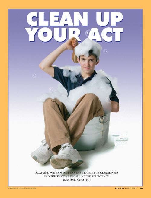 A conceptual photograph of a young man sitting in a small metal tub in his clothes and scrubbing with bubbles, paired with the words “Clean Up Your Act.”
