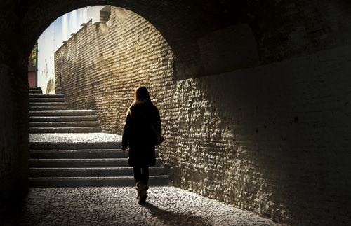 walking through a tunnel