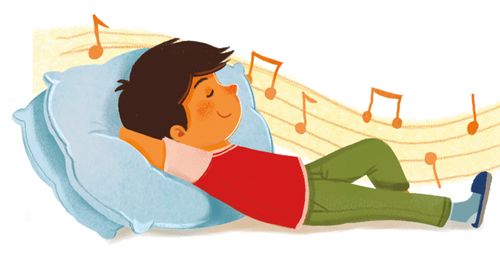 boy laying on pillow and listening to music