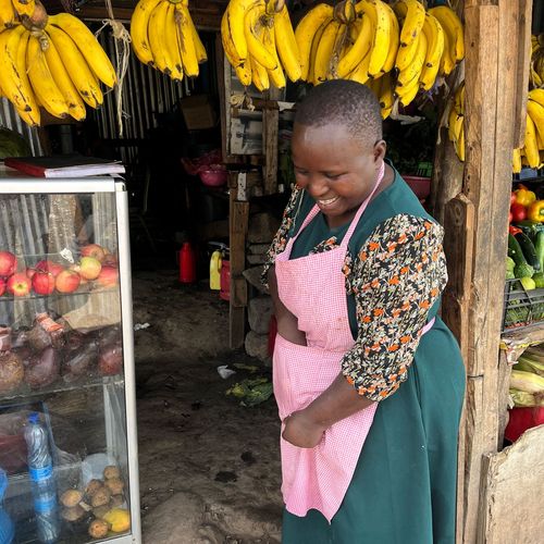 woman in apron smiling