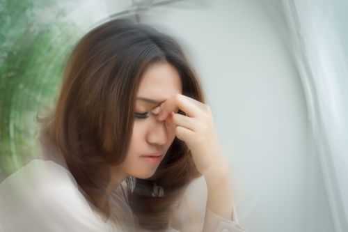 Woman feeling dizzy