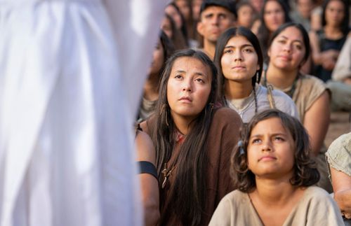 people portraying Nephites looking at the Savior