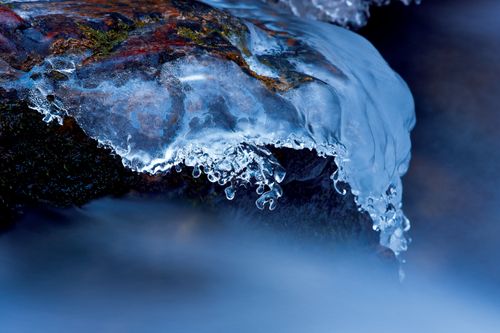 Water coming off a rock freezes and turns to ice up Big Cottonwood Canyon in Utah.