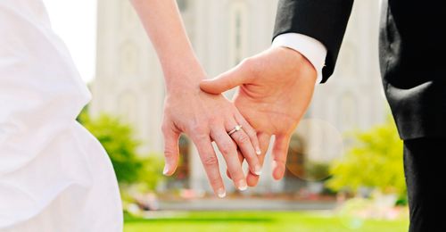 wedding couple holding hands