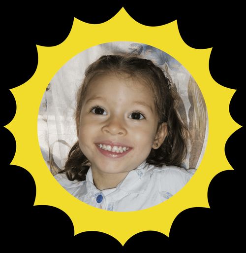 Headshot of a smiling little girl