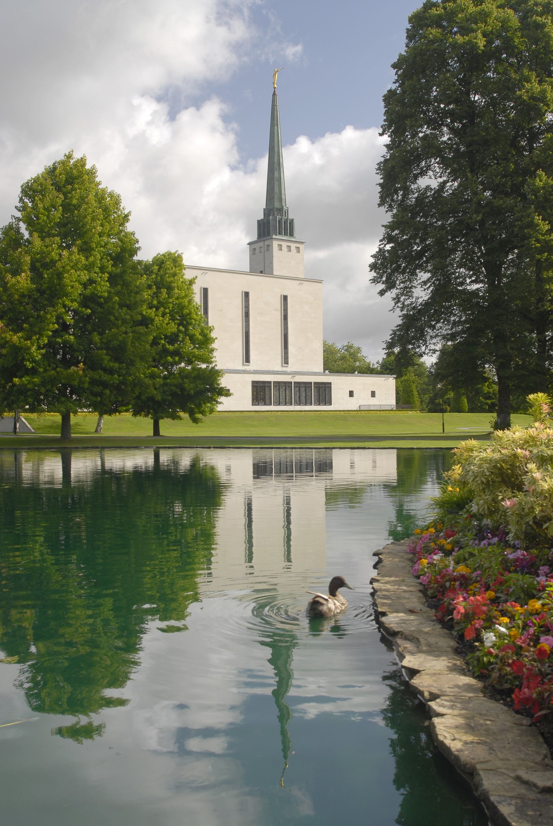 The London England Temple exterior, including the pond and scenery.