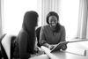 Two women using a tablet copmuter