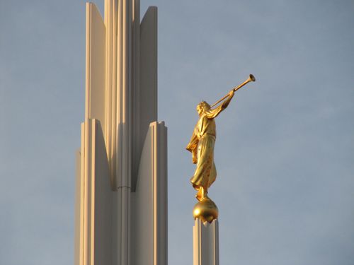 The angel Moroni statue on top of the Las Vegas Nevada Temple, with the stone of another spire seen to the left.