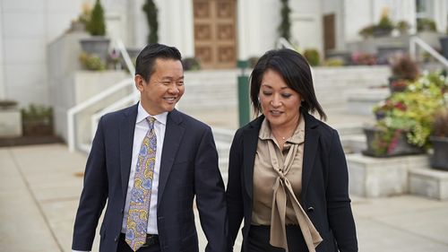 couple walking on temple grounds