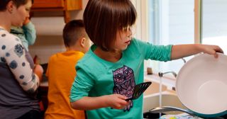 children help do the dishes