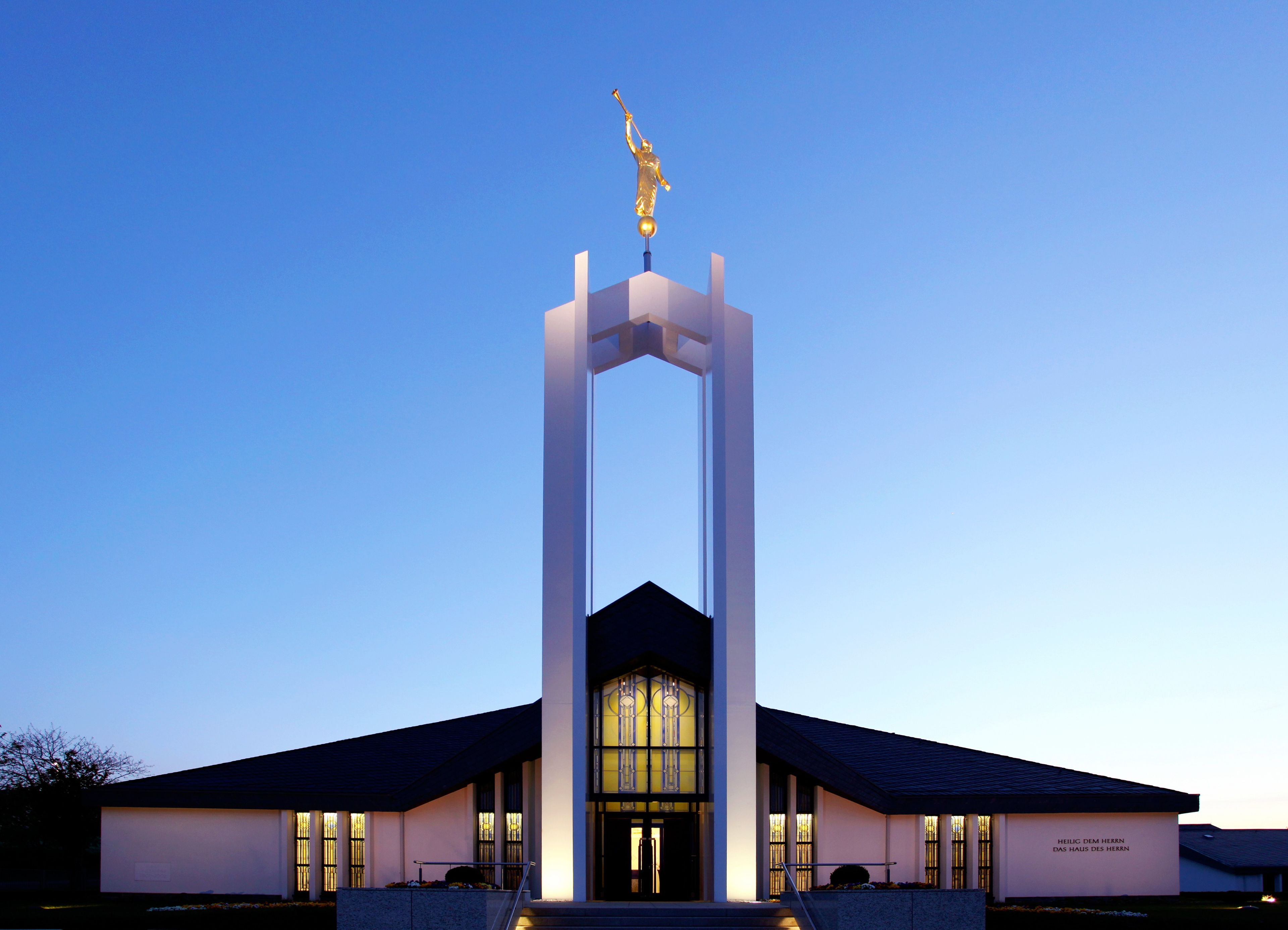 The Freiberg Germany Temple lit up at night.