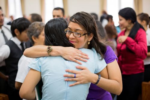 sisters embracing