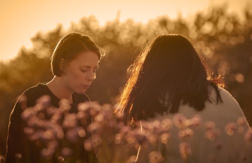 two women in a field