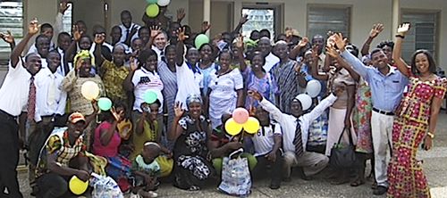 Participants, family members, and friends celebrate at graduation ceremonies for the district-sponsored literacy program.