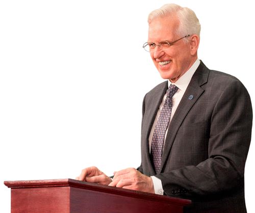 Elder Christofferson speaking at a podium