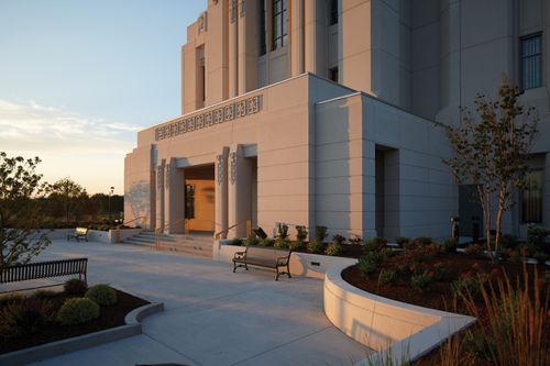 A detail photograph of the Meridian Idaho Temple entrance at sunset.