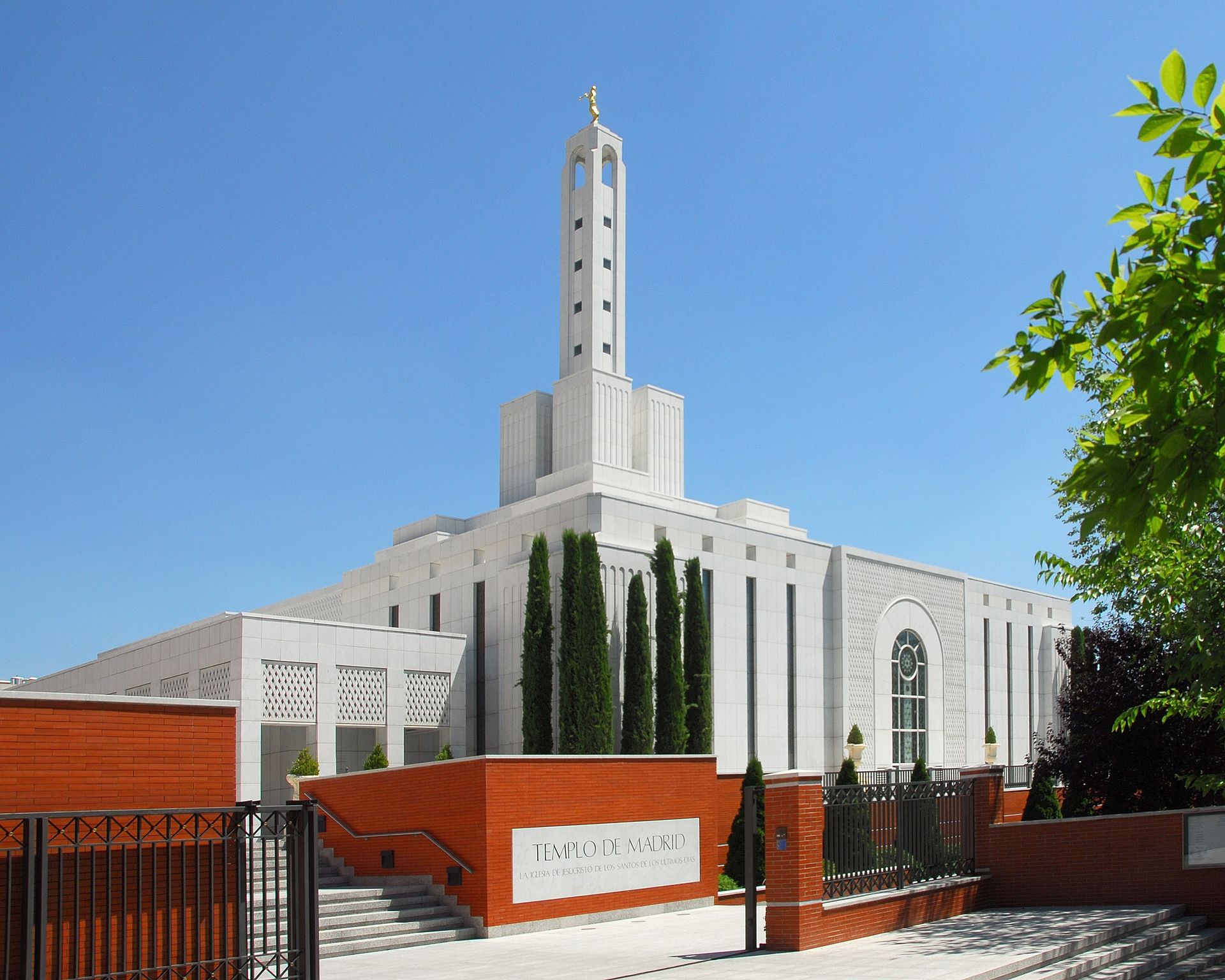 The Madrid Spain Temple name sign, including scenery and the exterior of the temple.
