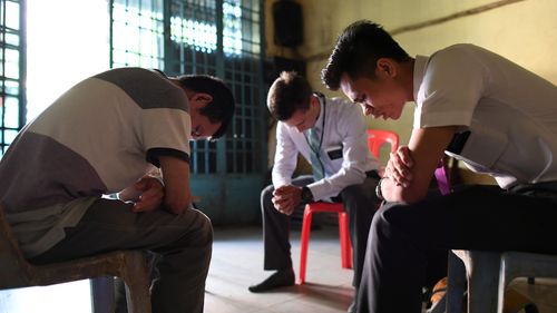 missionaries praying