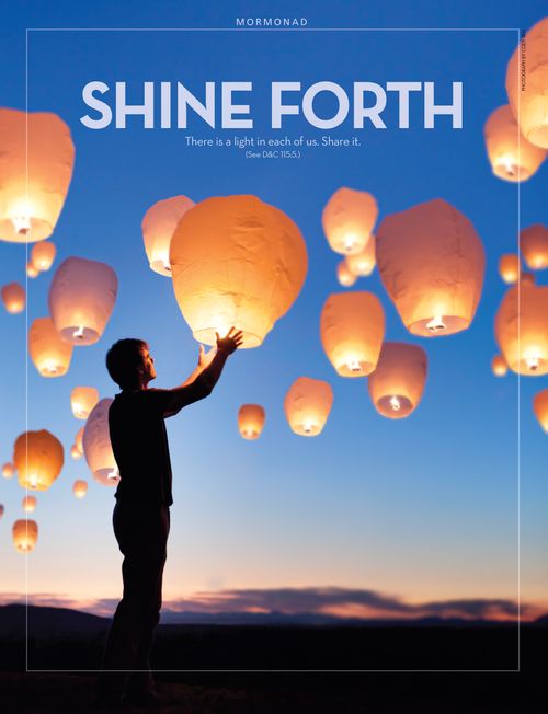 A photo of a man standing below sky lanterns floating in the night sky, paired with the words “Shine Forth.”