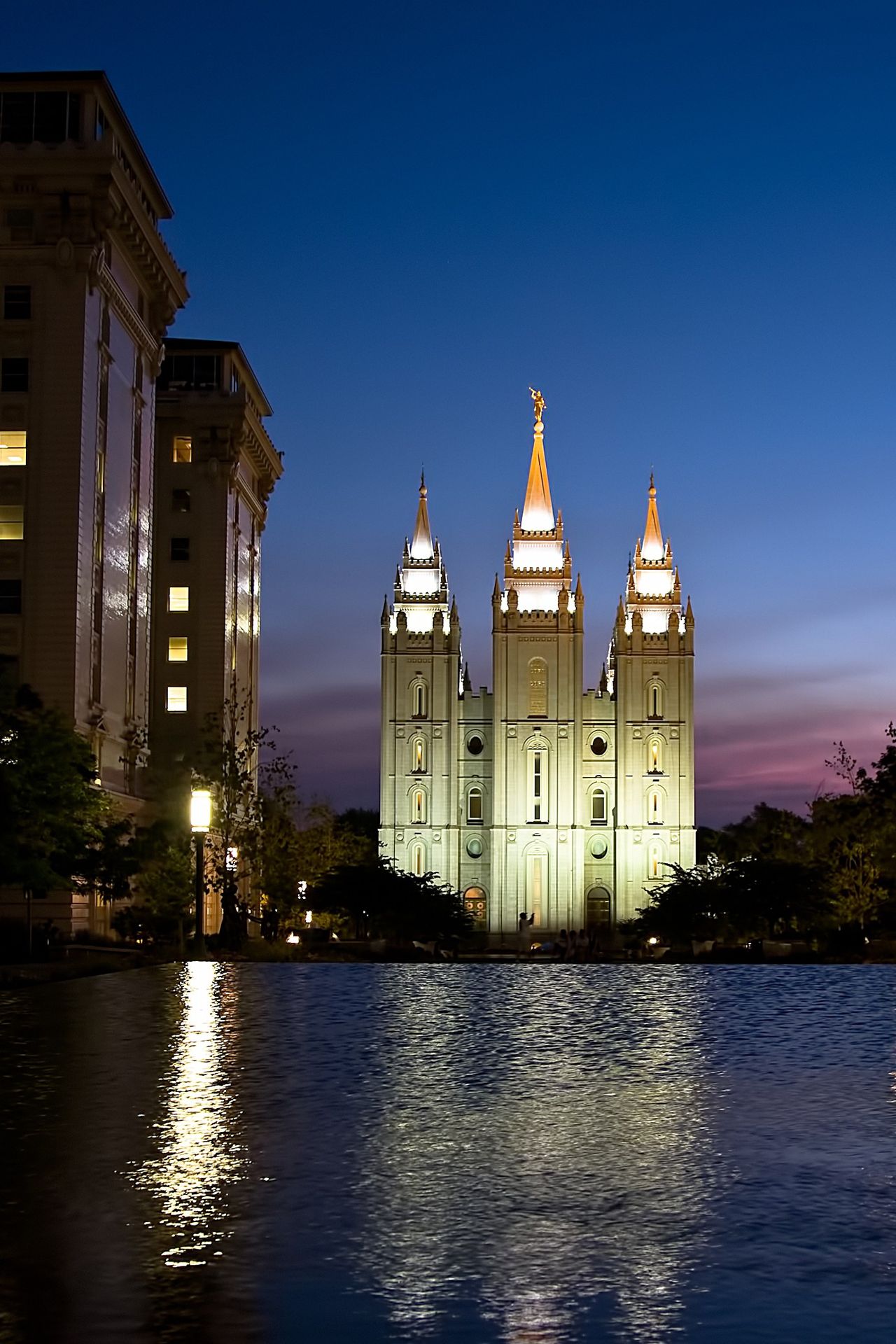 The Salt Lake Temple in the evening, including scenery.