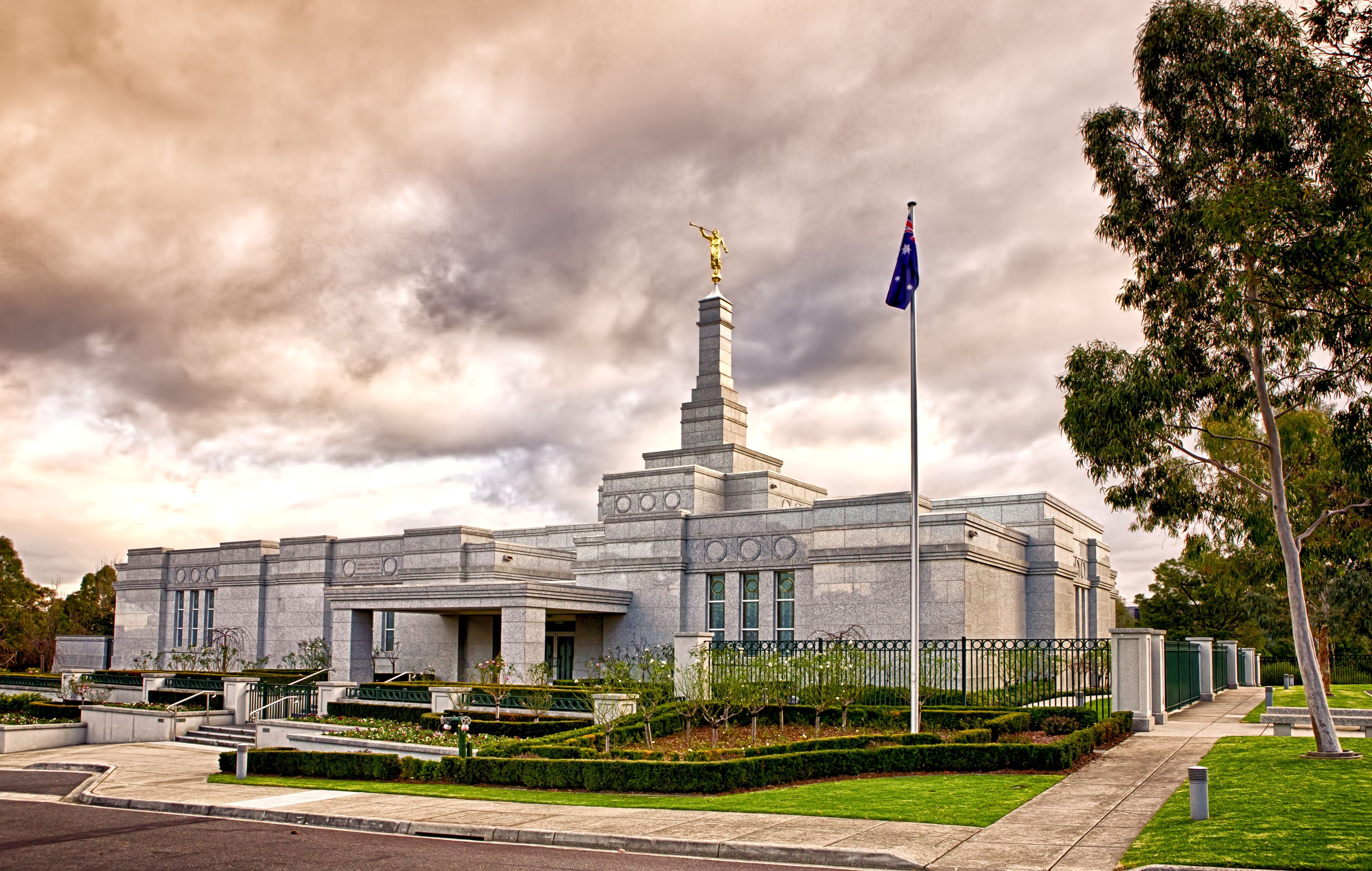 The Melbourne Australia Temple, including the entrance and scenery.