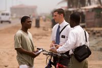 missionaries talking to man in Ghana