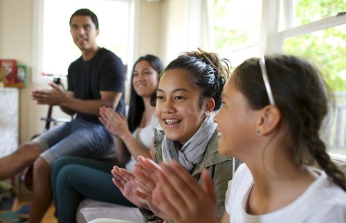 family clapping