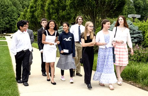 youth walking on temple grounds