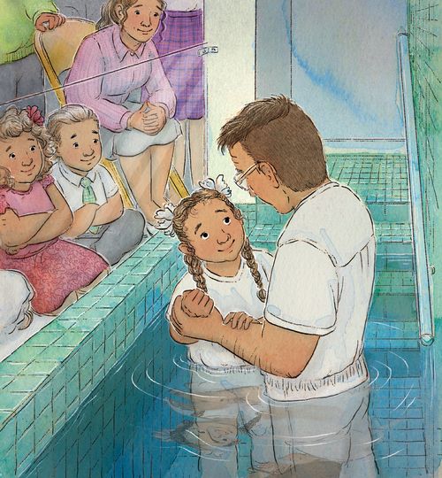 man baptizes child