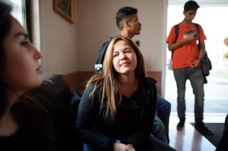 young woman looking at a peer