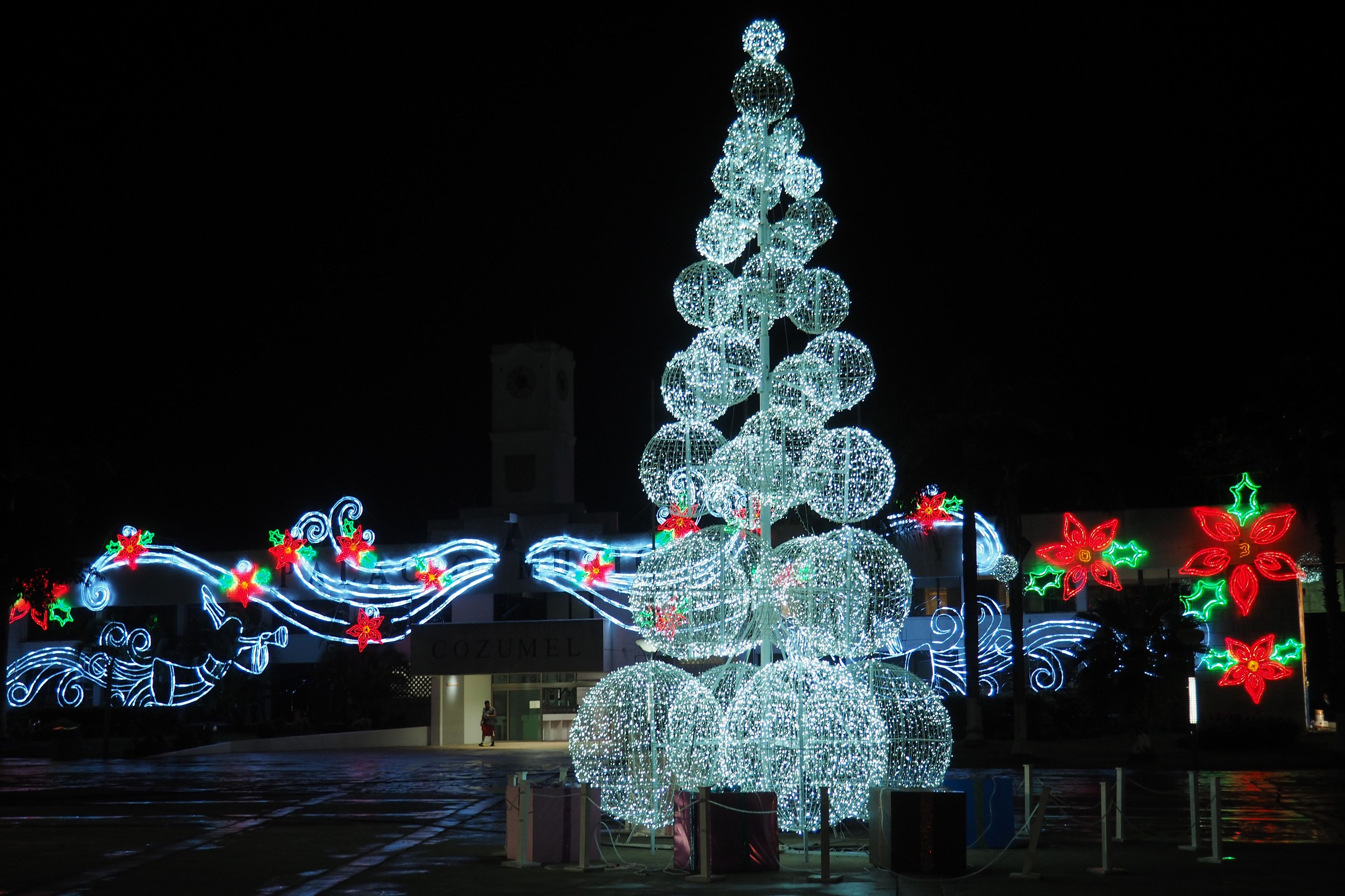 Illuminated Christmas tree in Cozumel, Mexico, at night.