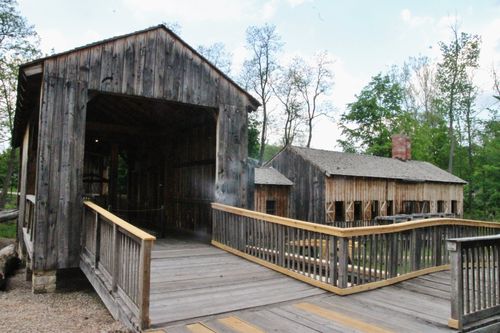The old sawmill in Kirtland, Ohio, with a gated ramp leading to the entrance.