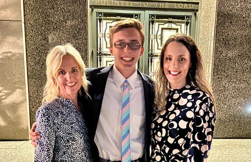 young man with birth mother and adoptive mother