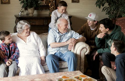 Miller family boys with elderly couple