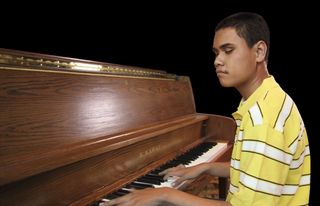 young man at piano