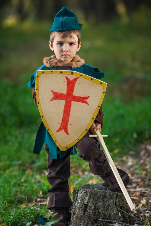 little boy with shield and sword