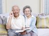 elderly couple on couch