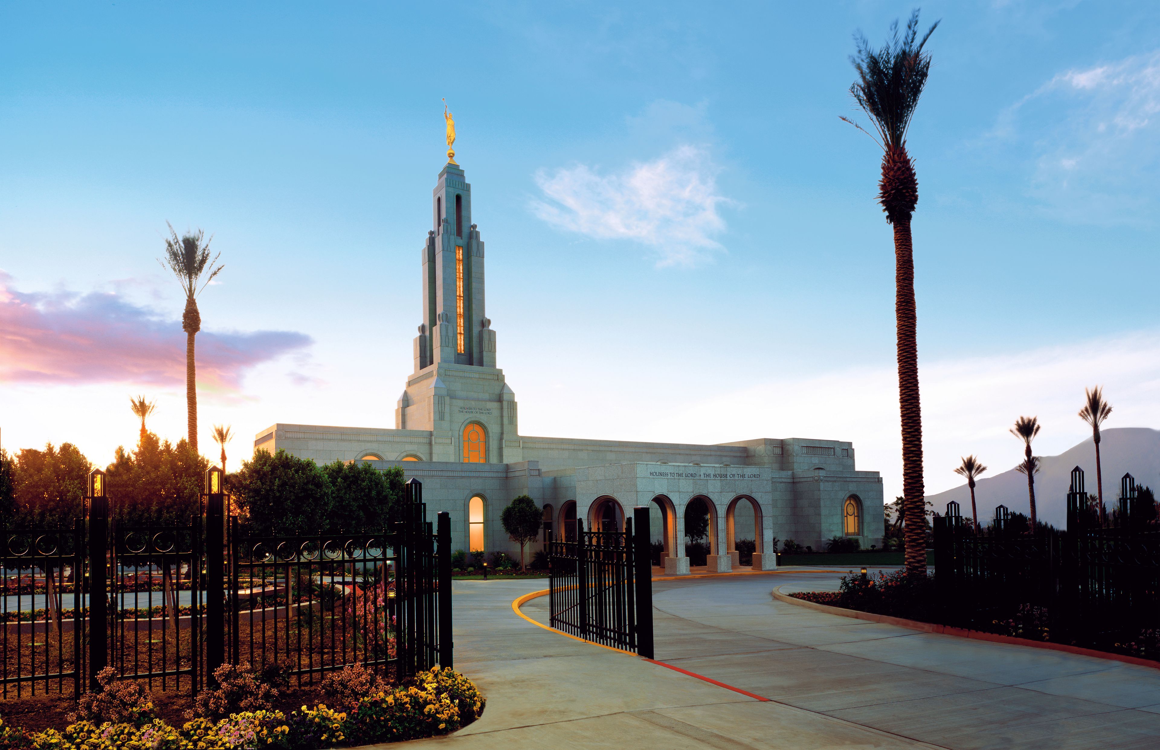 The Redlands California Temple at sunset, including the entrance and scenery.