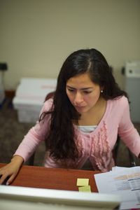 young woman working on computer